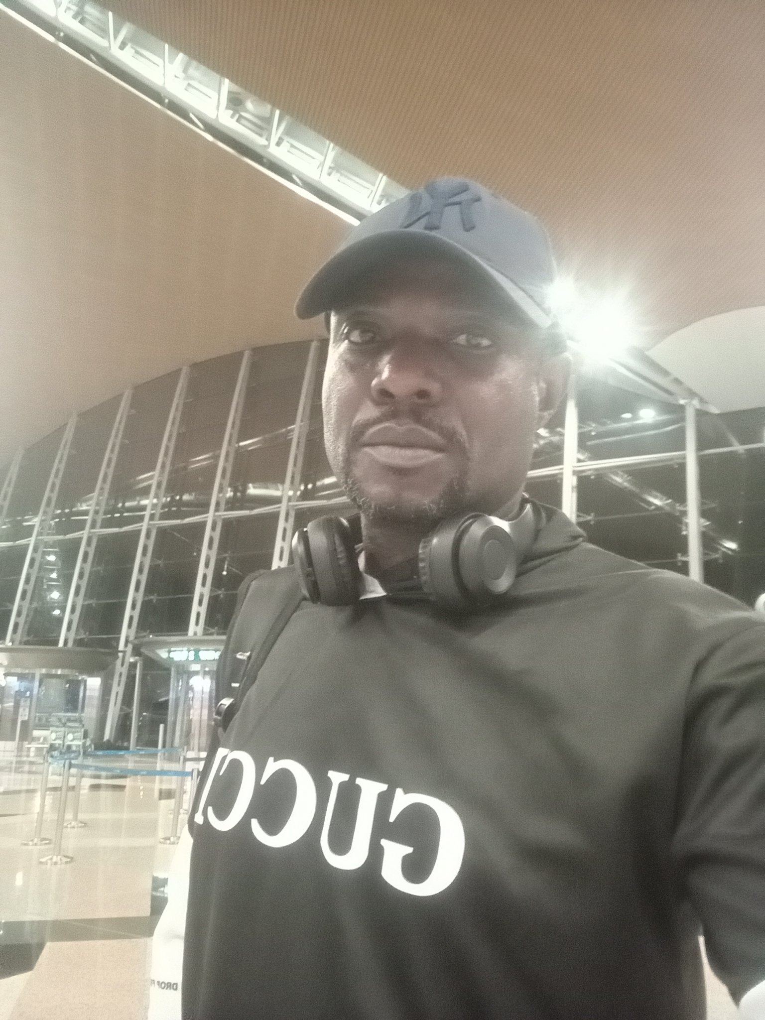 At an airport terminal, glass roof