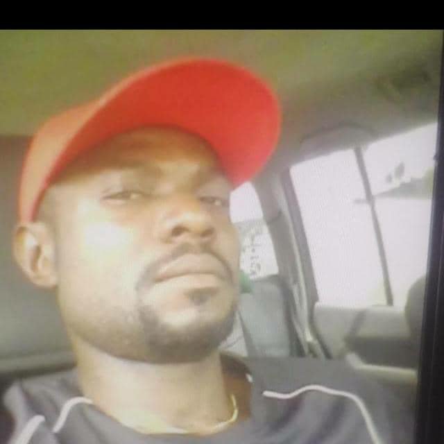 In a car, red cap
