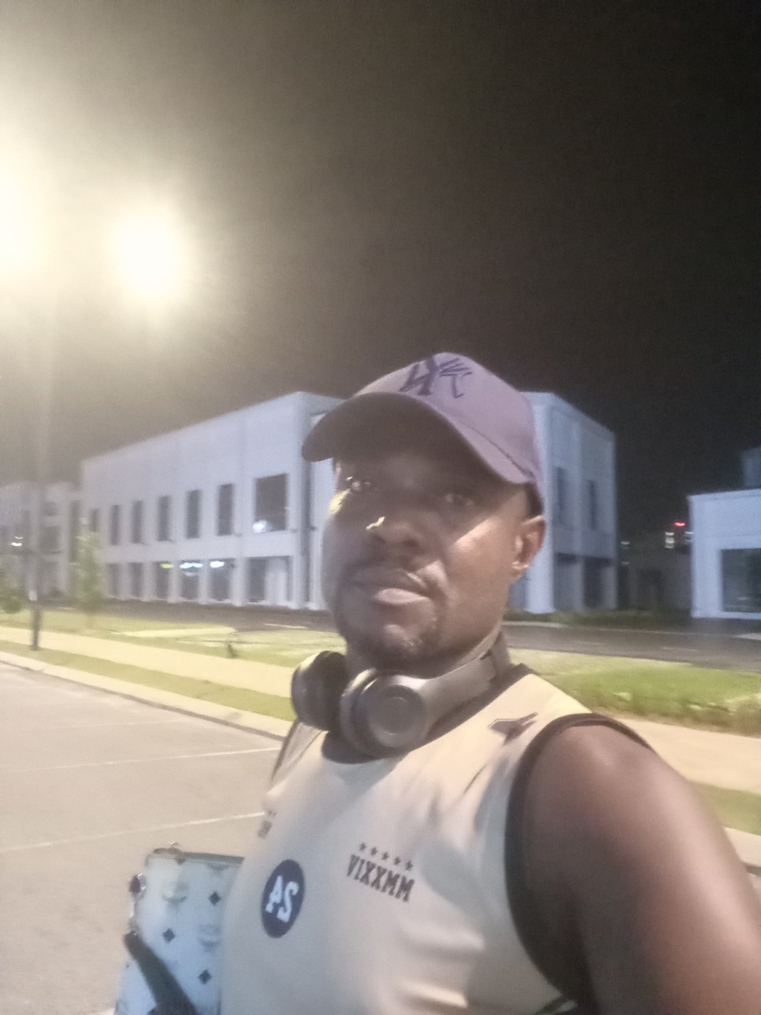 Outdoors at night, cap