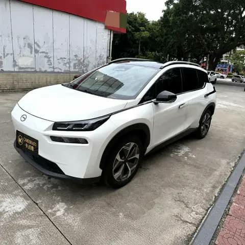 White Aion hatchback parked outdoors