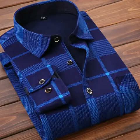 A folded blue check flannel shirt.