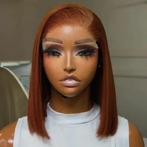 A straight copper-coloured bob wig on a mannequin head.