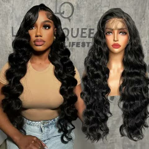 A long black body-wave wig shown worn and on a mannequin head.