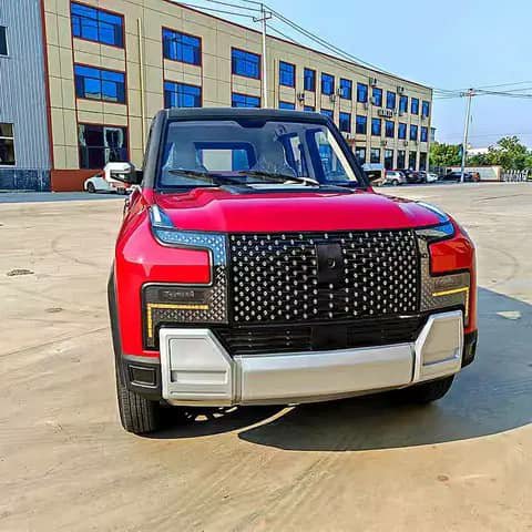 Red boxy SUV parked outdoors