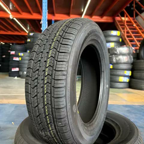 Single car tyre close-up in a warehouse