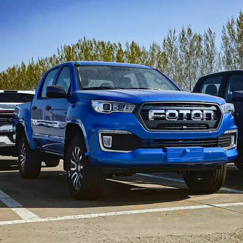 Blue Foton pickup parked in a lot