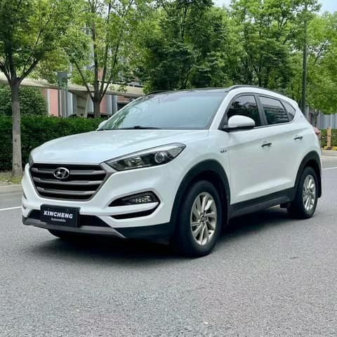 White Hyundai Tucson SUV on a street