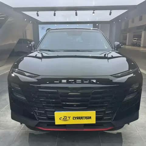 Black Jetour SUV in a showroom