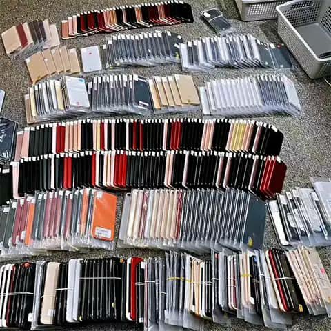 Rows of phones in many colours, bulk stock