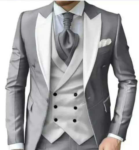 Grey suit with white lapels and vest