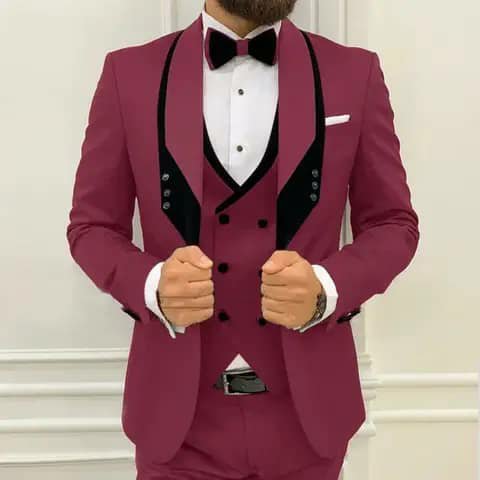 Magenta suit with black lapels and bow tie