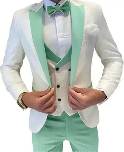 White suit with mint lapels, trousers and bow tie