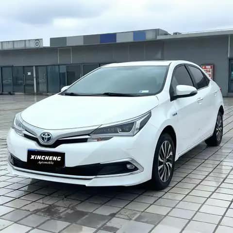White Toyota Corolla in a lot