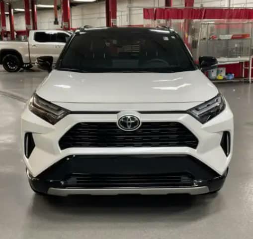 White Toyota RAV4 indoors