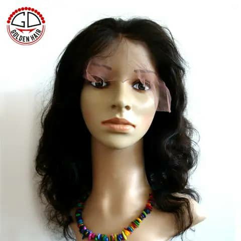 A short wavy black wig on a mannequin head.