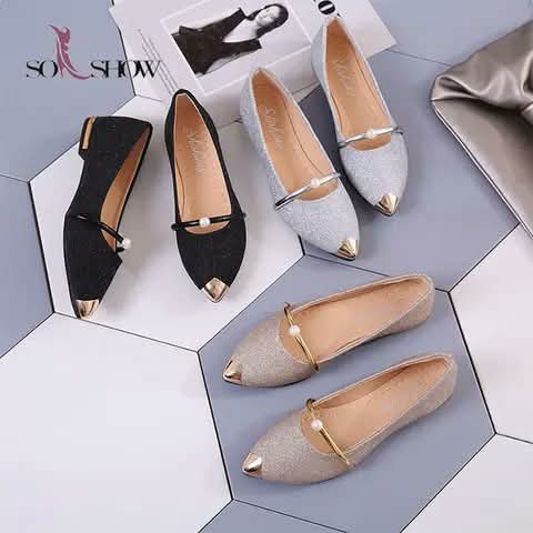 Women's glitter flats with pearl straps, in black, silver and champagne.